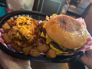 Cheeseburger with melted cheddar and crispy tater tots