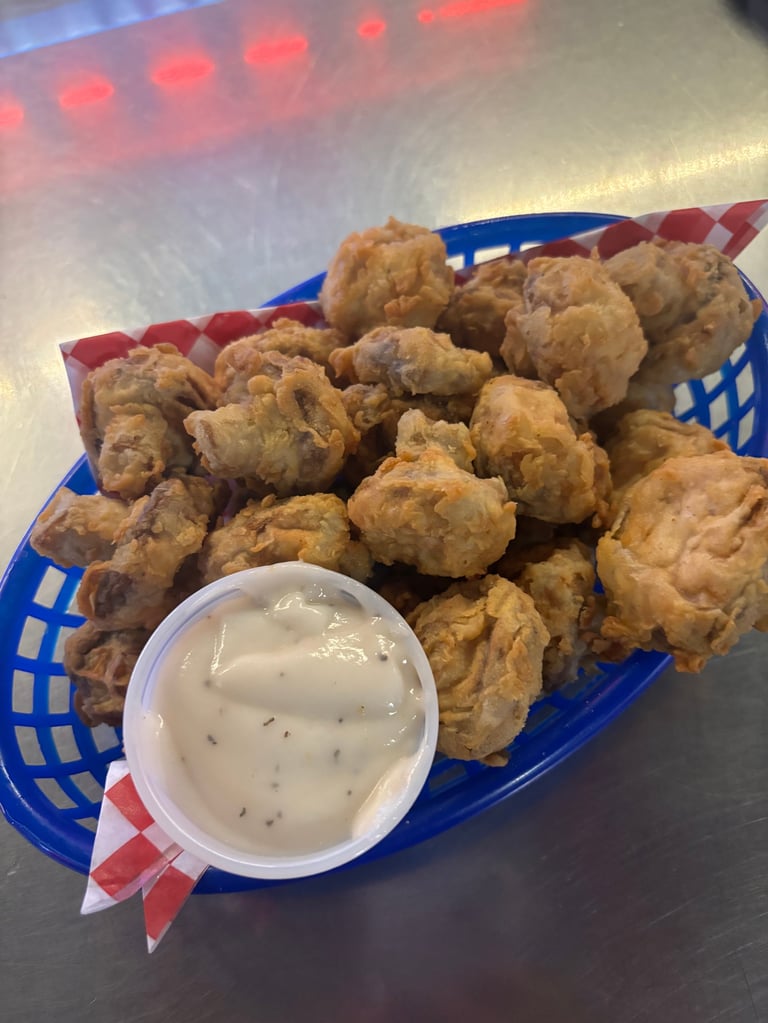 Crispy fried mushroom appetizer with dipping sauce